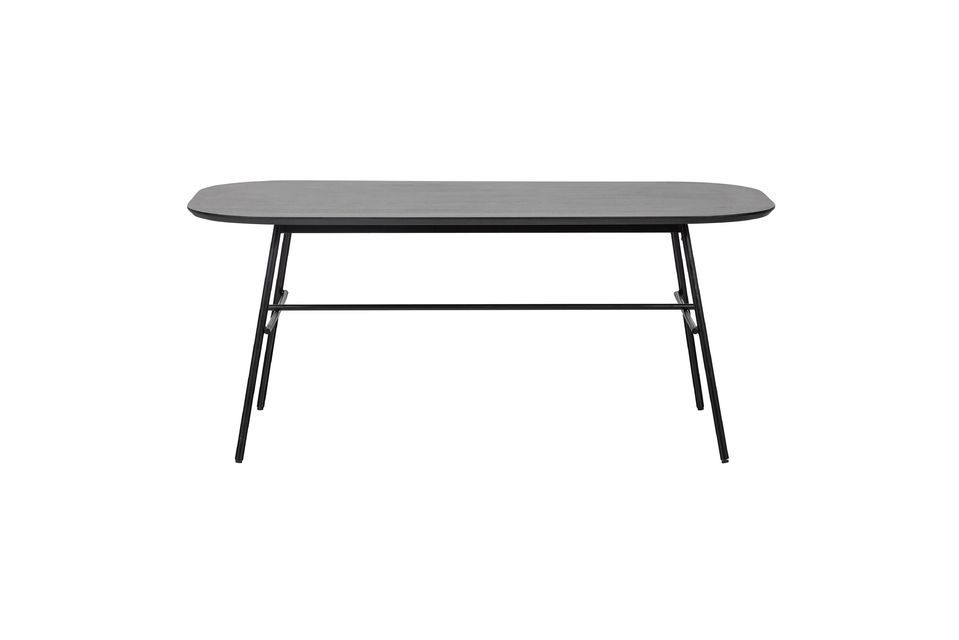 Der Tisch aus Mangoholz und schwarzem Metall Elegance trägt seinen Namen zu Recht